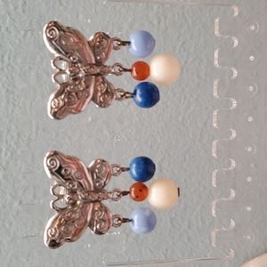 LCI butterfly clip earrings
